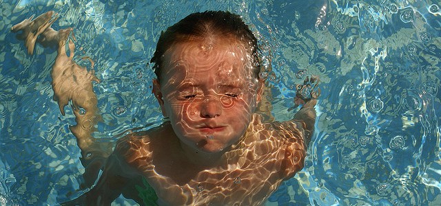 She makes a dive and for once it isn’t perfect. Resurfacing through ripples of water, she splutters and looks around as if to ask, “How’d that happen?” I shrug as she eases herself up onto the riverbank and she sticks her tongue out before composing herself, arms outstretched, head lowered....